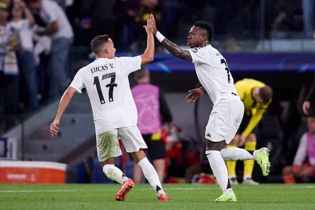 October 22, 2024, Madrid, Madrid, Spain: Vinicius Jr of Real Madrid CF celebrates after scoring a goal with Lucas Vazquez during the UEFA Champions League football match between Real Madrid CF and Borussia Dortmund at Santiago Bernabeu Stadium in Madrid, Spain, October 22, 2024 Madrid Spain - ZUMAa206 20241022_zsp_a206_067 Copyright: xRubenxAlbarranx