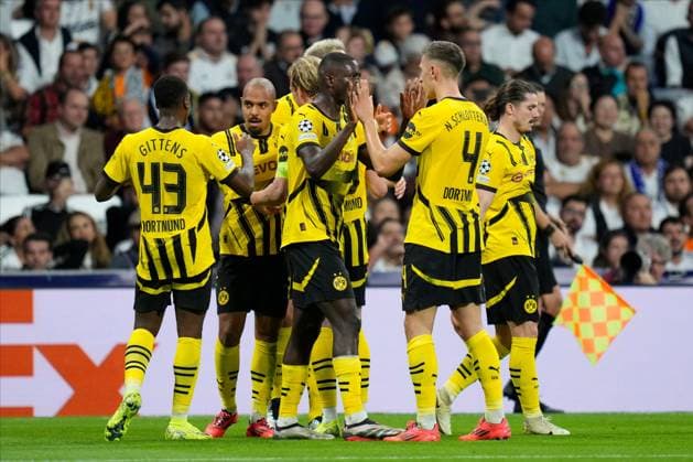 Donyell Malen of Borussia Dortmund celebrates goal with his teammates Real Madrid v Borussia Dortmund, UEFA Champios League match, date 3. Football, Santiago Bernabeu Stadium, Madrid, Spain - 22 Oct 2024 Editorial use only  Copyright: xPressinphoto Shutterstockx 14806059y