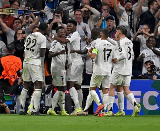 22 10 2024, Football UEFA Champions League 2024 2025, Matchday 3, Real Madrid Borussia Dortmund, at Estadio Santiango Bernabeu in Madrid Spain , Goal celebration after Vinicius Junior Real Madrids 5 2 DFL and DFB regulations prohibit any use of photographs as image sequences and or quasi video