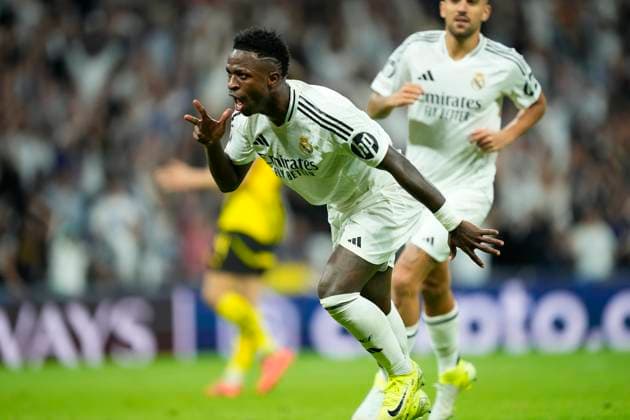 Real Madrid C.F. v Borussia Dortmund - UEFA Champions League 2024 25 League Phase MD3 Vinicius Junior left winger of Real Madrid and Brazil celebrates after scoring his sides third goal during the UEFA Champions League 2024 25 League Phase MD3 match between Real Madrid C.F. and Borussia Dortmund at Estadio Santiago Bernabeu on October 22, 2024 in Madrid, Spain. Madrid Spain  Copyright: xJosexBretonx originalFilename:bretonhernandez-realmadr241022_np4PC.jpg