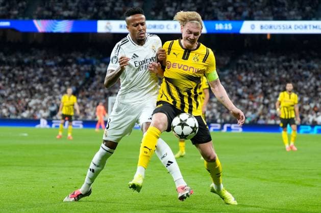 Eder Militao of Real Madrid CF and Julian Brandt of Borussia Dortmund Real Madrid v Borussia Dortmund, UEFA Champios League match, date 3. Football, Santiago Bernabeu Stadium, Madrid, Spain - 22 Oct 2024 Editorial use only  Copyright: xPressinphoto Shutterstockx 14806059j