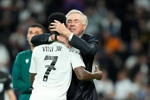Sport Bilder des Tages Real Madrid C.F. v Borussia Dortmund - UEFA Champions League 2024 25 League Phase MD3 Vinicius Junior left winger of Real Madrid and Brazil celebrates with Carlo Ancelotti head coach of Real Madrid after scoring his sides third goal during the UEFA Champions League 2024 25 League Phase MD3 match between Real Madrid C.F. and Borussia Dortmund at Estadio Santiago Bernabeu on October 22, 2024 in Madrid, Spain. Madrid Spain  Copyright: xJosexBretonx originalFilename:bretonhernandez-realmadr241022_np36s.jpg