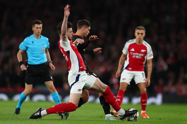 Heorhiy Sudakov of Shakhtar Donetsk is tackled by Declan Rice of Arsenal - Arsenal v Shakhtar Donetsk, UEFA Champions League, Emirates Stadium, London, UK - 22nd October 2024 Arsenal v Shakhtar Donetsk, UEFA Champions League, Group Stage, Football, Emirates Stadium, London, UK - 22 Oct 2024 EDITORIAL USE ONLY No use with unauthorised audio, video, data, fixture lists, club league logos or live services. Online in-match use limited to 120 images, no video emulation. No use in betting, games or single club league player publications. Copyright: xMDI Shutterstockx 14805154p