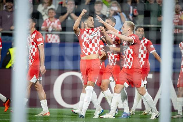 Juan Pedro Ramirez Girona FC celebrates after scoring his team s goal with team mates during a UEFA Champions League match between Girona FC and Slovan Bratislava at Estadi Municipal de Montilivi in Girona, Girona, Spain, on October 22 2024 Photo by Felipe Mondino Copyright: x@FELIPExMONDINOx