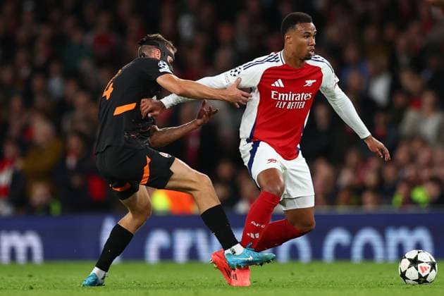 Gabriel of Arsenal under pressure from Danylo Sikan of Shakhtar Donetsk Arsenal v Shakhtar Donetsk, UEFA Champions League, Group Stage, Football, Emirates Stadium, London, UK, 22 Oct 2024 EDITORIAL USE ONLY No use with unauthorised audio, video, data, fixture lists, club league logos or live services. Online in-match use limited to 120 images, no video emulation. No use in betting, games or single club league player publications. Copyright: xSimonxDael Shutterstockx 14801590bs