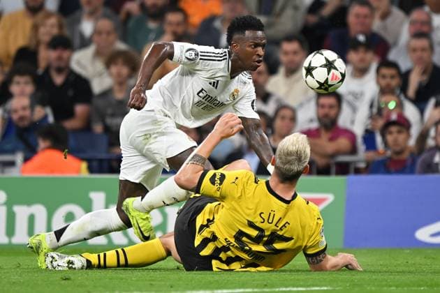 Madrid, Estadio Santiago Bernabeu, 22 10 24, GER, Men, UEFA Champions League, Season 2024 2025, Real Madrid Borussia Dortmund Picture from left in duel VINICIUS JUNIOR Real Madrid and Niklas SUELE Dortmund Only for editorial use UEFA regulations prohibit any use of photographs as image sequences and or quasi video Spain