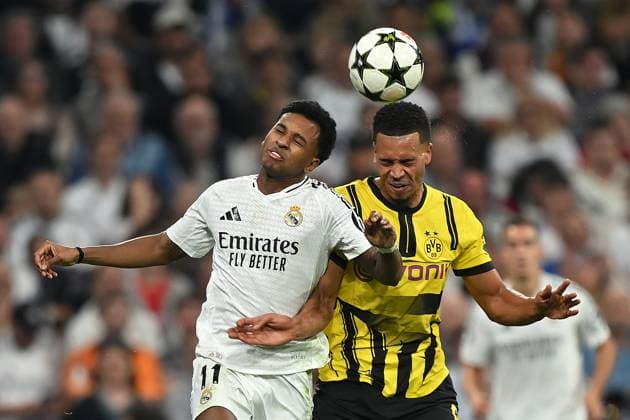 Madrid, Estadio Santiago Bernabeu, 22 10 24, GER, Men, UEFA Champions League, Season 2024 2025, Real Madrid Borussia Dortmund Picture from left in duel RODRYGO Real Madrid and Felix NMECHA Dortmund in header, header duel Only for editorial use UEFA regulations prohibit any use of photographs as image sequences and or quasi video Spain