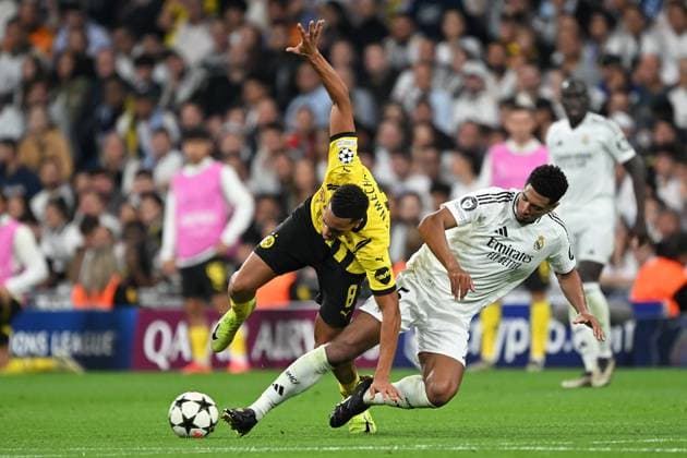 Madrid, Estadio Santiago Bernabeu, 22 10 24, GER, Men, UEFA Champions League, Season 2024 2025, Real Madrid Borussia Dortmund Picture from left in duel Felix NMECHA Dortmund and Jude BELLINGHAM Real Madrid Only for editorial use UEFA regulations prohibit any use of photographs as image sequences and or quasi video Spain