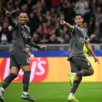 (241023) -- MILAN, Oct. 23, 2024 -- AC Milan s Tijjani Reijnders (R) celebrates his second goal with his teammate Noah Okafor during the UEFA Champions League match between AC Milan and Club Brugge in Milan, Italy, Oct. 22, 2024. (Photo by Xinhua) (SP)ITALY-MILAN-FOOTBALL-UEFA CHAMPIONS LEAGUE-AC MILAN VS CLUB BRUGGE AlbertoxLingria 