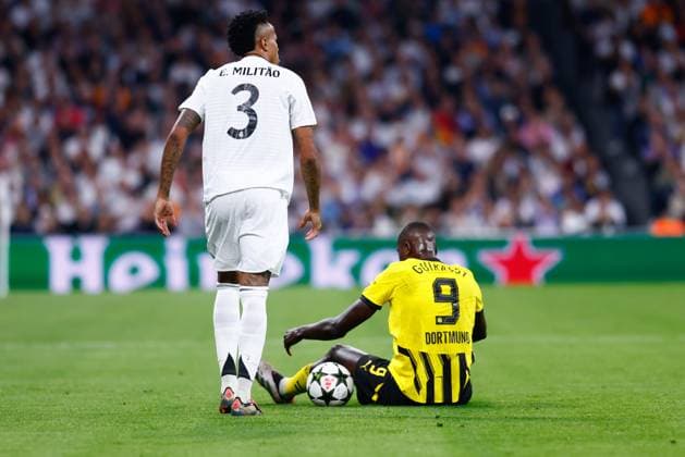 October 22, 2024, Madrid, Madrid, SPAIN: Eder Gabriel Militao of Real Madrid laments during the UEFA Champions League 2024 25 League Phase MD3 match between Real Madrid CF and Borussia Dortmund at Estadio Santiago Bernabeu on October 22, 2024, in Madrid, Spain. Madrid SPAIN - ZUMAa181 20241022_zaa_a181_341 Copyright: xDennisxAgyemanx
