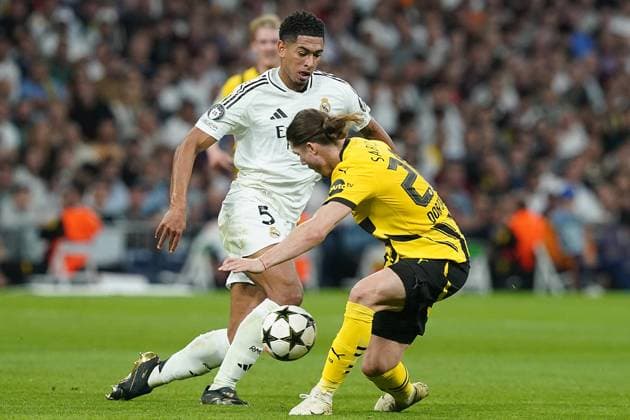 Champions League - Real Madrid v Borussia Dortmund Real Madrid CF s Jude Bellingham (l) and Borussia Dortmund s Marcel Sabitzer during Champions League match Real Madrid v Borussia Dortmund on October 22, 2024 in Madrid, Spain. Photo by Acero AlterPhotos ABACAPRESS.COM Madrid Spain  Copyright: xAcero AlterPhotos ABACAx