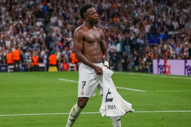 October 22, 2024, Madrid, Spain: Vinicius Jr. celebrates a goal during a Champions League match. Real Madrid defeated Borussia Dortmund 5-2 tonight at the Santiago Bernabeu Stadium in the UEFA Champions League. Madrid Spain - ZUMAs197 20241022_aaa_s197_654 Copyright: xDavidxCanalesx