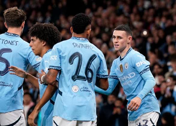 Manchester, England, 23rd October 2024. Phil Foden of Manchester City celebrates scoring his sides opening goal during the UEFA Champions League match at the Etihad Stadium, Manchester. Picture credit should read: Andrew Yates Sportimage EDITORIAL USE ONLY. No use with unauthorised audio, video, data, fixture lists, club league logos or live services. Online in-match use limited to 120 images, no video emulation. No use in betting, games or single club league player publications. SPI-3405-0017