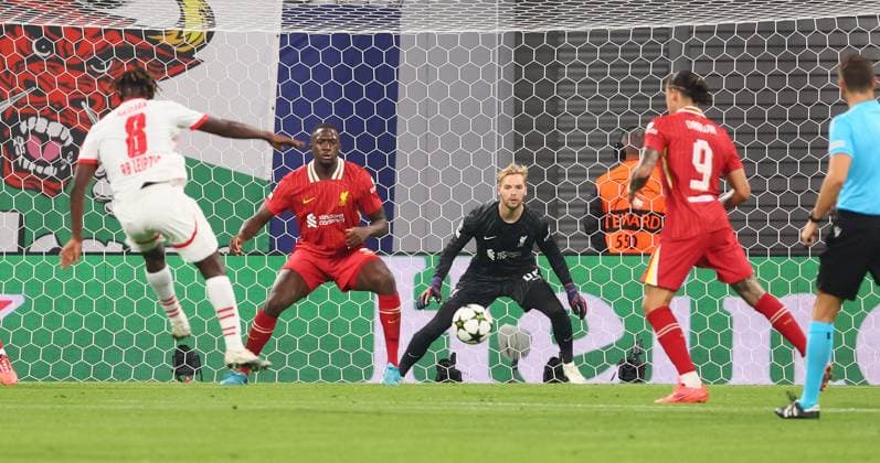 RB Leipzig Liverpool Champions League Leipzig, 23 10 2024, Red Bull Arena, Soccer, UEFA Champions League, Matchday 3 , RB Leipzig vs Liverpool FC , In the picture shot on goal by Amadou Haidara 8, RB Leipzig vs goalkeeper Caoimhin Kelleher 62, Liverpool , For editorial use only Only editorial use , UEFA regulations prohibit any use of photographs as image sequences and or quasi video ,