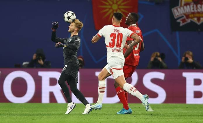 Caoimhin Kelleher of Liverpool heads the ball RB Leipzig v Liverpool, UEFA Champions League, Group Stage, Football, Red Bull Arena, Leipzig, Germany, 23 Oct 2024 EDITORIAL USE ONLY No use with unauthorised audio, video, data, fixture lists, club league logos or live services. Online in-match use limited to 120 images, no video emulation. No use in betting, games or single club league player publications.  Copyright: xKieranxMcManus Shutterstockx 14801646s