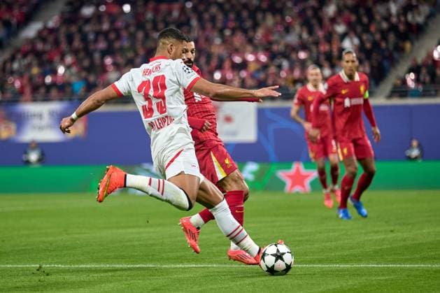 23 10 2024, Football, Men, Champions League, League phase, 2024 2025, Matchday 3, RB Leipzig Liverpool FC Benjamin Henrichs 39, RB Leipzig , cross, action, with ball, free kick Leipzig Red Bull Arena Saxony Germany