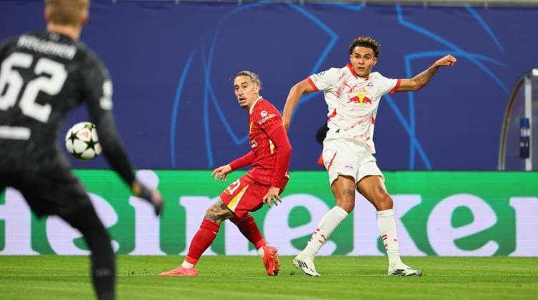 RB Leipzig Liverpool Champions League Leipzig, 23 10 2024, Red Bull Arena, Football, UEFA Champions League, Matchday 3 , RB LEIPZIG vs FC LIVERPOOL , Pictured from l Goalkeeper Caoimhin Kelleher 62, Liverpool , Konstantinos Tsimikas 21, Liverpool and Antonio Nusa 7, RB Leipzig , Picture Point