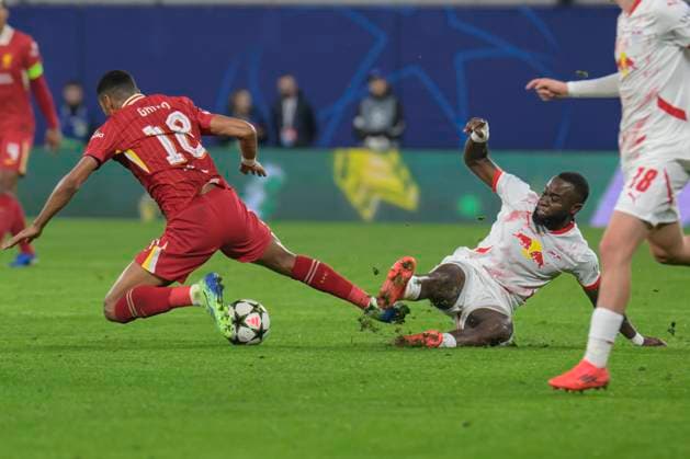 GER, Saxony, Leipzig, Champions League RB Leipzig vs Liverpool FC, CHL, UCL, Matchday, Season 2024 2025, RB Arena, f l in picture Cody Gakpo FC Liverpool 09 , Lutsharel Geertruida RB Leipzig 03 , duel, action, fight, fighting for the ball, foul, 23 10 2024, Copyright: HMBxMedia UwexKoch