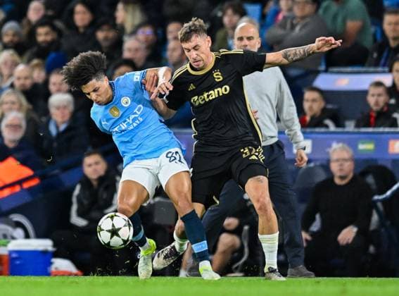 Manchester City v AC Sparta Prague UEFA Champions League Rico Lewis of Manchester City and Matej Rynes of Sparta Prague during the UEFA Champions League match at the Etihad Stadium, Manchester UK Newspapers OUT Copyright: xKarlxVallantinex FIL-20817-0032