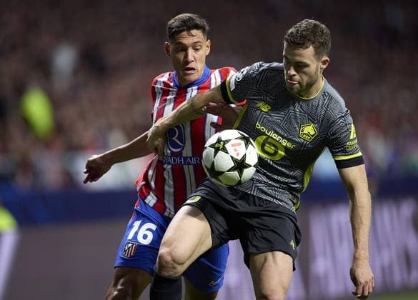 Nahuel Molina of Atletico de Madrid competes for the ball with Gabriel Gudmundsson of Lille OSC during the UEFA Champions League match between Atletico de Madrid v LSCO Lille at Riyadh Air Metropolitano Stadium on October 23, 2024 in Madrid (Photo by: LGM) FOOTBALL : Atletico de Madrid vs LSCO Lille - UEFA Ligue des Champions - 23 10 2024 LGM Panoramic 