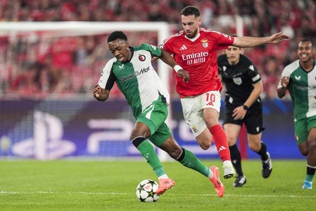 UEFA Champions League: SL Benfica v Feyenoord Lisbon - Antoni Milambo of Feyenoord, Orkun Kokcu of SL Benfica during the third round of new format of the UEFA Champions League 2024 2025. The match is set between SL Benfica and Feyenoord at Estadio da Luz on 23 October 2024 in Lisbon, Portugal. Copyright: xTomxBodex