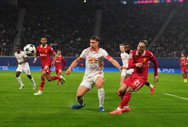 Champions League Group Phase day 3: RB Leipzig vs Liverpool October 23 2024: Konstantinos Tsimikas of Liverpool controls the ball during a Champions League Group Phase day 3 game, RB Leipzig vs Liverpool, at Red Bull Arena, Leipzig, Germany. Ulrik Pedersen CSM (Credit Image: Â Ulrik Pedersen Cal Media) Leipzig Germany EDITORIAL USE ONLY Copyright: xx ZUMA-20241023_zma_c04_021.jpg UlrikxPedersenx csmphotothree309269