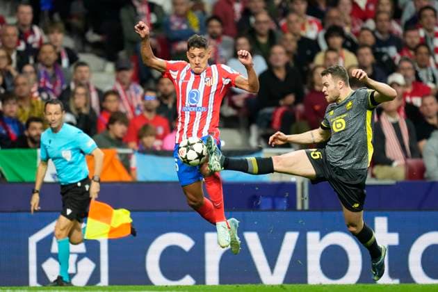Atletico de Madrid v LOSC Lille - UEFA Champions League 2024 25 League Phase MD3 Nahuel Molina right-back of Atletico de Madrid and Argentina and Gabriel Gudmundsson left-back of LOSC Lille and Sweden compete for the ball during the UEFA Champions League 2024 25 League Phase MD3 match between Atletico de Madrid and LOSC Lille at Riyadh Air Metropolitano on October 23, 2024 in Madrid, Spain. Madrid Spain  Copyright: xJosexBretonx originalFilename:bretonhernandez-atletico241023_npMpQ.jpg