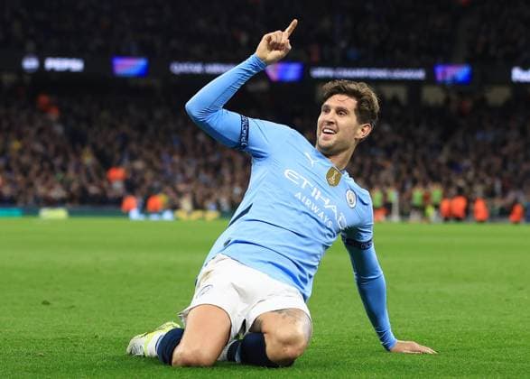 John Stones of Manchester City celebrates scoring a goal to make it 3-0 Manchester City v Sparta Praha, UEFA Champions League, Group Stage, Football, Etihad Stadium, Manchester, UK, 23 Oct 2024 EDITORIAL USE ONLY No use with unauthorised audio, video, data, fixture lists, club league logos or live services. Online in-match use limited to 120 images, no video emulation. No use in betting, games or single club league player publications. Copyright: xMattxWest Shutterstockx 14801642ag