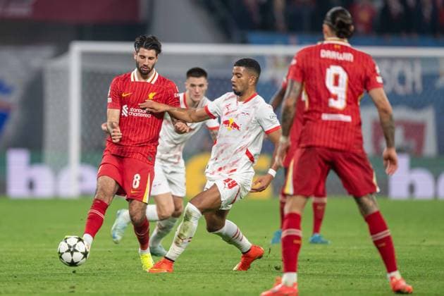 Dominik Szoboszlai and Benjamin Henrichs during UEFA Champions league match, RB Leipzig - FC Liverpool , 23. october 2024 Copyright: xMICHALxFAJT,ZOSPORTU.SKx DSC_4977