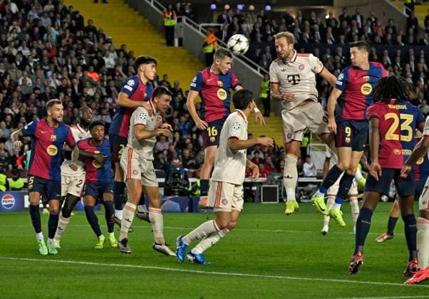 23 10 2024, Football UEFA Champions League 2024 2025, Matchday 3, FC Barcelona FC Bayern Munich, at Estadi Olimpic Lluis Companys Barcelona Harry Kane FC Bayern Munich fights his way through DFL and DFB regulations prohibit any use of photographs as image sequences and or quasi video