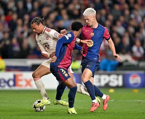 23 10 2024, Football UEFA Champions League 2024 2025, Matchday 3, FC Barcelona FC Bayern Munich, at Estadi Olimpic Lluis Companys Barcelona v l Alejandro Balde FC Barcelona v Leroy Sane Bayern Munich DFL and DFB regulations prohibit any use of photographs as image sequences and or quasi video