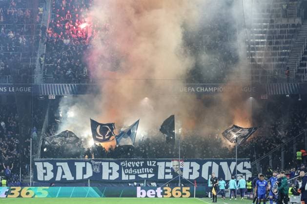 SOCCER - UEFA CL, RBS vs Zagreb SALZBURG,AUSTRIA,23.OCT.24 - SOCCER - UEFA Champions League, Red Bull Salzburg vs GNK Dinamo Zagreb. Image shows supporters of Zagreb with flares and smoke. Keywords: Bad Blue Boys.  GEPAxpictures xDavidxGeieregger