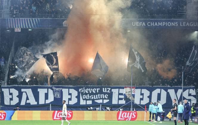 SOCCER - UEFA CL, RBS vs Zagreb SALZBURG,AUSTRIA,23.OCT.24 - SOCCER - UEFA Champions League, Red Bull Salzburg vs GNK Dinamo Zagreb. Image shows supporters of Zagreb with flares and smoke. Keywords: Bad Blue Boys.  GEPAxpictures xDavidxGeieregger