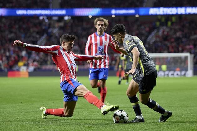 Giuliano Simeone of Atletico de Madrid competes for the ball with Osame Sahraoui of Lille OSC during the UEFA Champions League match between Atletico de Madrid v LSCO Lille at Riyadh Air Metropolitano Stadium on October 23, 2024 in Madrid (Photo by: LGM) FOOTBALL : Atletico de Madrid vs LSCO Lille - UEFA Ligue des Champions - 23 10 2024 LGM Panoramic 