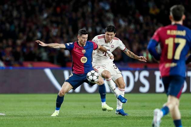 October 23, 2024, Barcelona, Barcelona, SPAIN: Robert Lewandowski of FC Barcelona, Barca and Min-jae Kim of Bayern Munchen in action during the UEFA Champions League 2024 25 League Phase MD3 match between FC Barcelona and FC Bayern Munchen at Estadi Olimpic Lluis Companys on October 23, 2024 in Barcelona, Spain. Barcelona SPAIN - ZUMAa181 20241023_zaa_a181_161 Copyright: xIrinaxR.xHipolitox