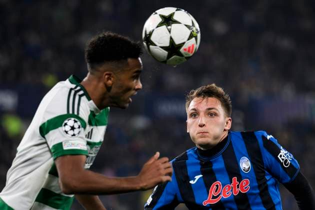 Atalanta BC v Celtic FC - UEFA Champions League Mateo Retegui of Atalanta BC competes for the ball with Auston Trusty of Celtic FC during the UEFA Champions League 2024 25 league phase football match between Atalanta BC and Celtic FC. Bergamo Italy Copyright: xNicolòxCampox