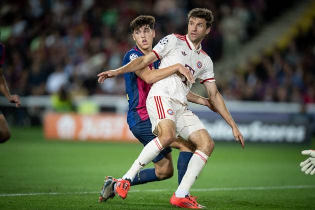 Pau Cubarsi FC Barcelona, Barca and Thomas Mueller (FC Bayern Munich) battle for the ball during a UEFA Champions League match between FC Barcelona and Bayern Munich at Estadi Olimpic Lluís Companys in Barcelona, Barcelona, Spain, on October 23 2024. Photo by Felipe Mondino Panoramic FOOTBALL : FC Barcelone Vs FC Bayern Munich - Ligue des Champions - 23 10 2024 FelipeMondino Panoramic 