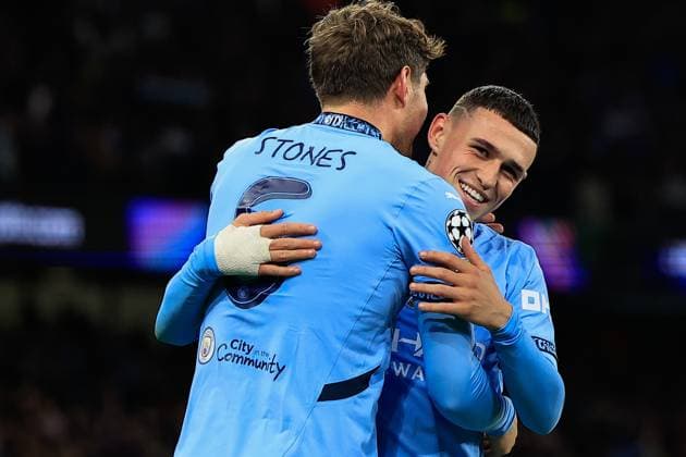 Manchester City v Sparta Prague Champions League 23 10 2024. Phil Foden (47) of Manchester City embraces goalscorer John Stones (5) of Manchester City who makes it 3-0 during the Champions League match between Manchester City and Sparta Prague at the Etihad Stadium, Manchester, England on 23 October 2024. Manchester Etihad Stadium Manchester England Editorial use only , Copyright: xConorxMolloyx PSI-20645-0099