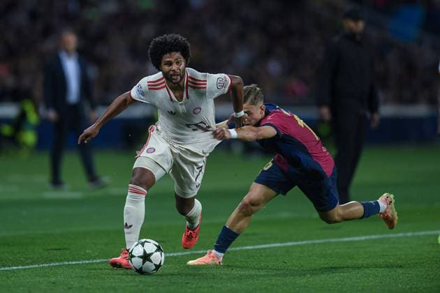 FC Barcelona, Barca v FC BAYERN MUNCHEN OLIMPIC STADIUM LLUIS COMPANYS. MONTJUIC,BARCELONA. OCTOBER 23,2024 FC BARCELONA vs FC BAYERN MUNCHEN October 23,2024 Serge Gnabry (7) of FC Bayern München dribbles Fermin Lopez (16) of FC Barcelona during the UEFA Champions League 2024 25 League Phase MD4 match between FC Barcelona and FC Bayern Munchen at Olimpic Stadium Lluis Companys of MontjuÃ¯c in Barcelona, Spain. Barcelona ESP Copyright: xS.xRosx