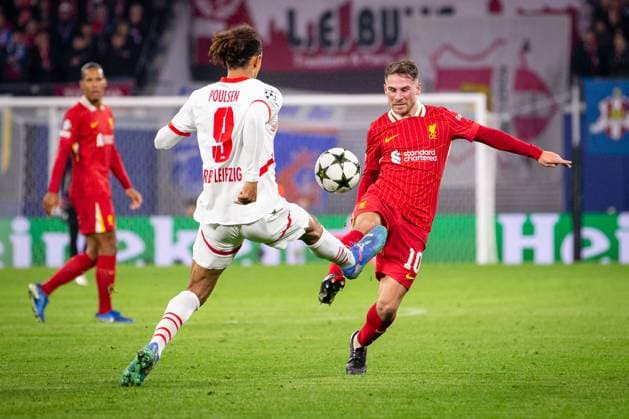 RB Leipzig v Liverpool, UEFA Champions League football, Leipzig, Germany Leipzig, Germany. 23rd, October 2024. Alexis Mac Allister (10) of Liverpool and Yussuf Poulsen (9) of RB Leipzig seen during the UEFA Champions League match between RB Leipzig and Liverpool at the Red Bull Arena in Leipzig. Germany, Leipzig  Copyright: xGonzalesxPhoto InakixEsnaolax