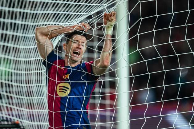 (241024) -- BARCELONA, Oct. 24, 2024 -- Robert Lewandowski of FC Barcelona, Barca reacts during the third round match of UEFA Champions League between FC Barcelona and Bayern Munich in Barcelona, Spain, Oct. 23, 2024. (Photo by Xinhua) (SP)SPAIN-BARCELONA-FOOTBALL-UEFA CHAMPIONS LEAGUE-FC BARCELONA VS BAYERN MUNICH JoanxGosa 