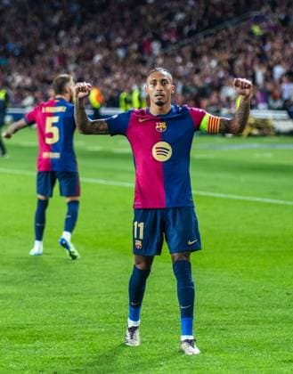(241024) -- BARCELONA, Oct. 24, 2024 -- Raphinha of FC Barcelona, Barca celebrates his goal during the third round match of UEFA Champions League between FC Barcelona and Bayern Munich in Barcelona, Spain, Oct. 23, 2024. (Photo by Xinhua) (SP)SPAIN-BARCELONA-FOOTBALL-UEFA CHAMPIONS LEAGUE-FC BARCELONA VS BAYERN MUNICH JoanxGosa 