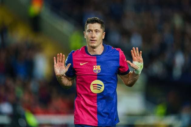 (241024) -- BARCELONA, Oct. 24, 2024 -- Robert Lewandowski of FC Barcelona, Barca reacts during the third round match of UEFA Champions League between FC Barcelona and Bayern Munich in Barcelona, Spain, Oct. 23, 2024. (Photo by Xinhua) (SP)SPAIN-BARCELONA-FOOTBALL-UEFA CHAMPIONS LEAGUE-FC BARCELONA VS BAYERN MUNICH JoanxGosa 