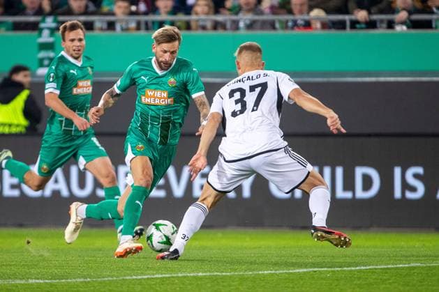SOCCER - UEFA ECL, Rapid vs Noah VIENNA,AUSTRIA,24.OCT.24 - SOCCER - UEFA Conference League, SK Rapid Wien vs FC Noah Yerevan. Image shows Guido Burgstaller (Rapid) and Goncalo Silva (Noah).  GEPAxpictures xPhilippxBrem
