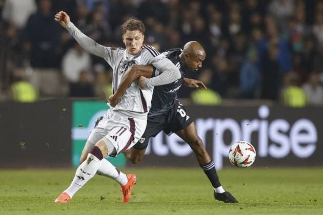 BAKOE, 24-10-2024, Tofiq Bahramov Stadium , season 2024 2025 , Europa League match between FK Qarabag and Ajax . Ajax player Mika Godts and Qarabag player Julio Romao Qarabag - Ajax  x26552878x Copyright: