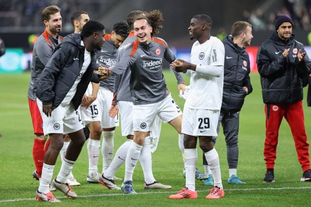 Eintracht Frankfurt FC Rigas FS, UEFA Europa League Eric Junior Dina Ebimbe Eintracht Frankfurt, 26 , Arthur Theate Eintracht Frankfurt, 3 and Niels Nkounkou Eintracht Frankfurt, 29 celebrate together with the fans in the Nordwestkurve after the end of the match during the league phase of the UEFA Europa League between Eintracht Frankfurt and FC Rigas FS on October 24, 2024 at Deutsche Bank Park in Frankfurt am Main , Frankfurt am Main Hessen Germany Deutsche Bank Park