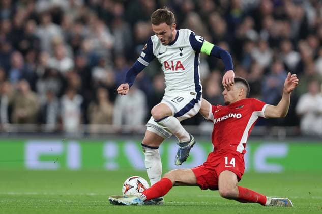 London, England, 24th October 2024. James Maddison of Tottenham Hotspur and Kristijan BeliÄ‡ of AZ Alkmaar challenge for the ball during the UEFA Europa League match at the Tottenham Hotspur Stadium, London. Picture credit should read: Paul Terry Sportimage EDITORIAL USE ONLY. No use with unauthorised audio, video, data, fixture lists, club league logos or live services. Online in-match use limited to 120 images, no video emulation. No use in betting, games or single club league player publications. SPI-3406-0009