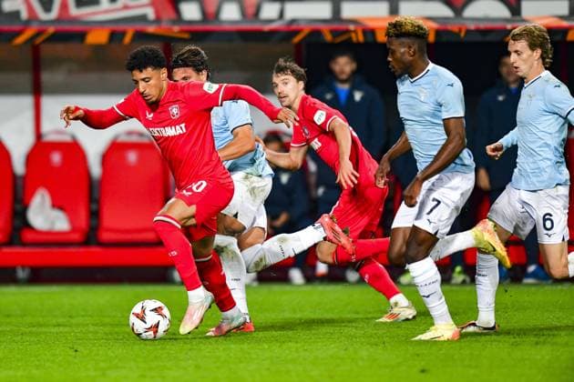ENSCHEDE, Stadium Grolsch Veste, 24-10-2024 , season 2024 2025, Europa League FC Twente player Sayfallah Ltaief and Lazio Roma player Fisayo Dele-Bashiru, Lazio Roma player Nicolo Rovella during the match Twente - Lazio Roma Twente - Lazio Roma  x26554924x Copyright: