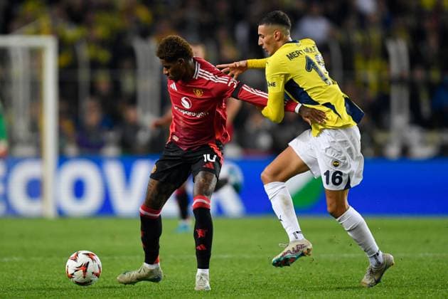 Marcus Rashford of Manchester United, ManU battles with Mert Müldür of Fenerbahce S.K. Fenerbahce v Manchester United, UEFA Europa League, Group Stage, Football, Sukru Saracoglu Stadium, Istanbul, Turkey, 24 Oct 2024 EDITORIAL USE ONLY No use with unauthorised audio, video, data, fixture lists, club league logos or live services. Online in-match use limited to 120 images, no video emulation. No use in betting, games or single club league player publications. Copyright: xAlexxNicodim Shutterstockx 14801667hw