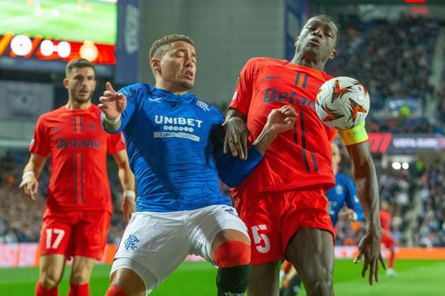 Rangers v Steaua Bucharest Europa League 24 10 2024. James Tavernier of Rangers FC battles with Joyskim Dawa of FC Steaua Bucharest for possession during the Europa League match between Rangers and Steaua Bucharest at Ibrox, Glasgow, Scotland on 24 October 2024. Editorial use only , Copyright: xColinxPoultneyx PSI-20659-0021